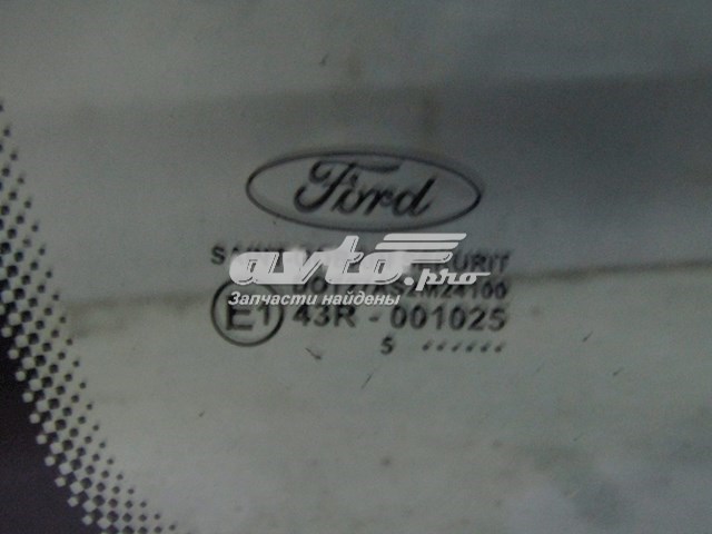 1320711 Ford скло багажного відсіку, ліве