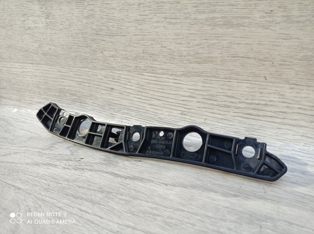 Купити GN1517A870AA Ford Кронштейн бампера переднього, лівий