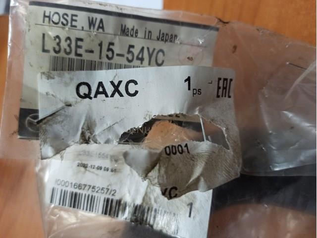 Купити L33E1554YC Mazda Трубопроводи і шланги системи охолодження