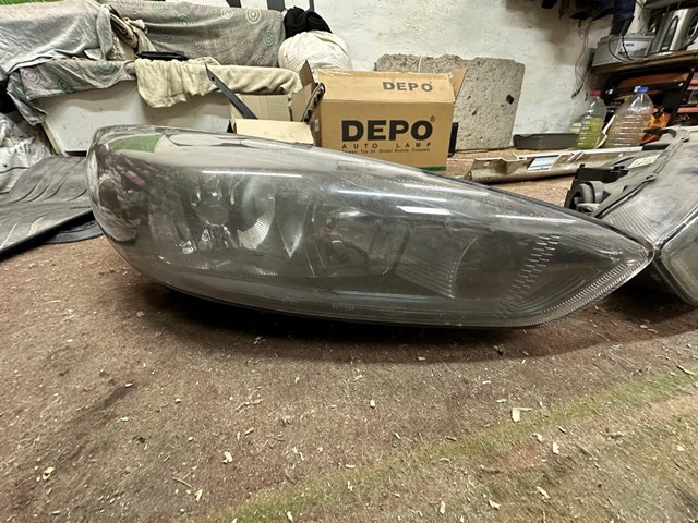 Фара ліва F1EB13W030ME Ford