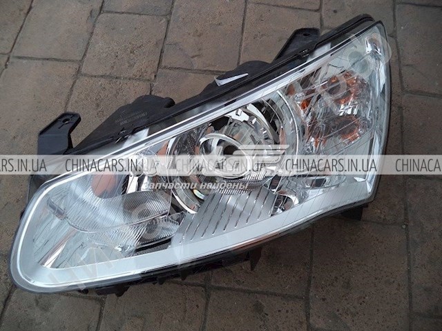 Фара ліва 1067002009 Geely