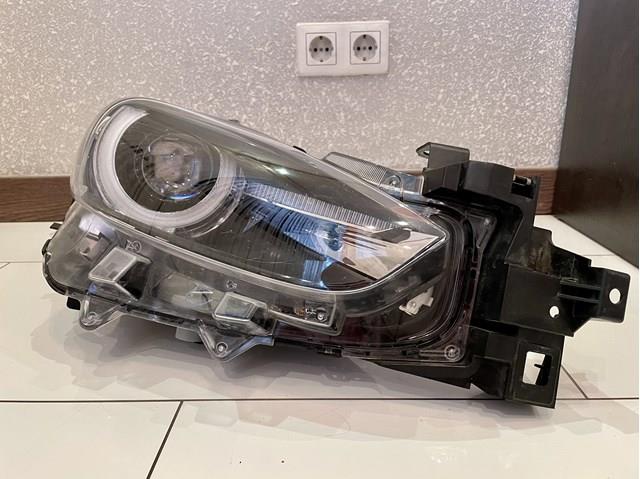 Фара права B63C51030 Mazda