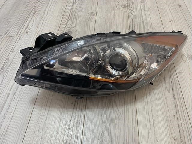 Фара ліва BDG751040 Mazda
