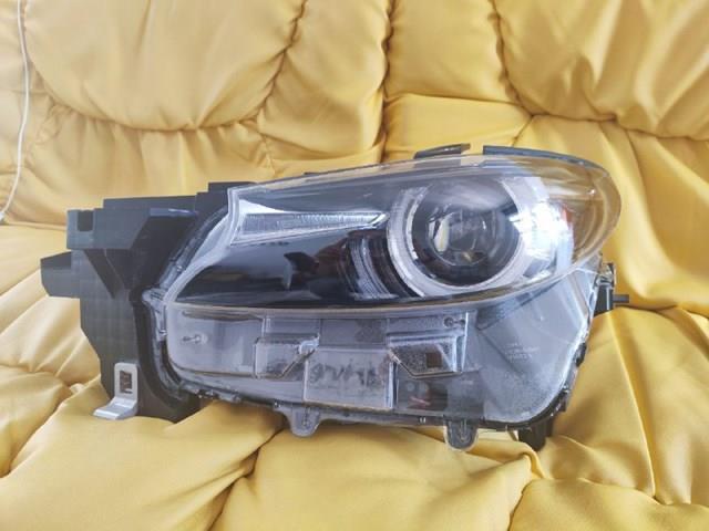 Фара Mazda TM5551041B