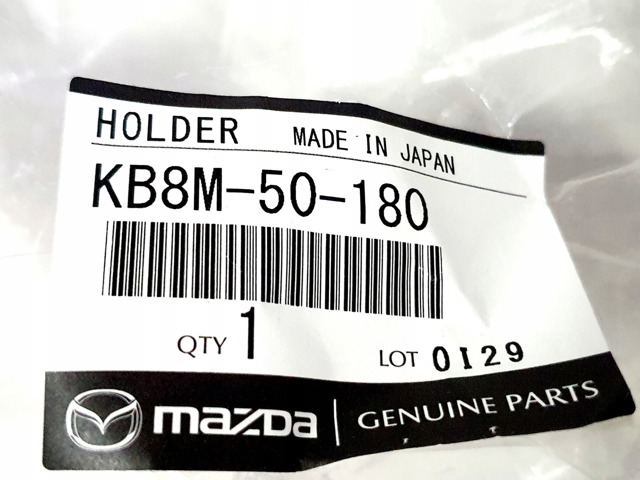 KB8M50180 Mazda Рамка номерного знака автомобіля передня