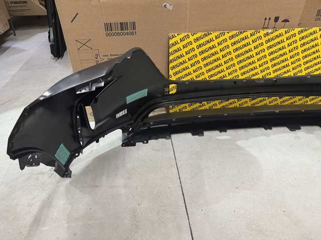 Бампер передній Mazda KMV650031ABB