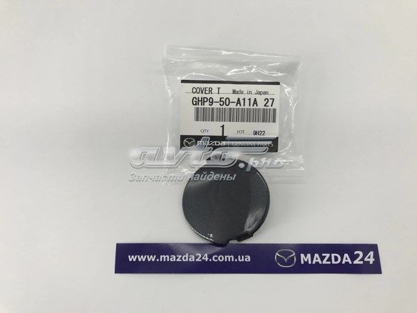 Заглушка бампера буксирувального гака, передня Mazda GHP950A11A27 ціна, від 6.35 USD