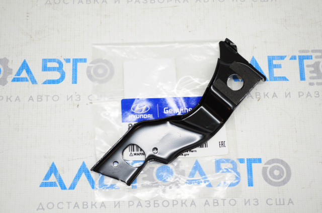 865762W000 Hyundai/Kia Кронштейн бампера переднього, правий
