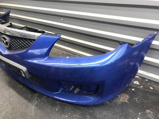 Передній бампер C10050031DAA Mazda
