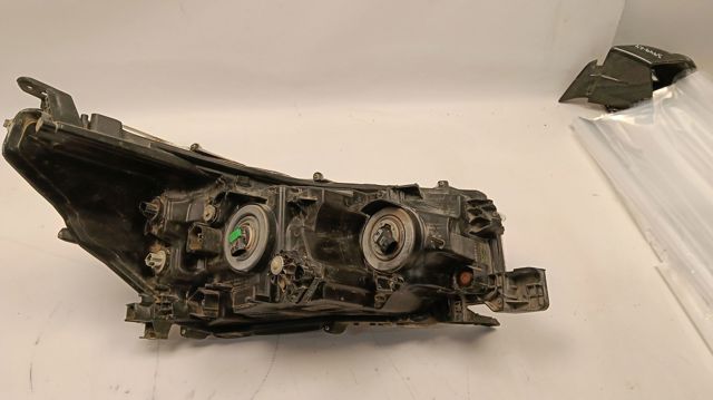 Фара ліва 811500KK60 Toyota