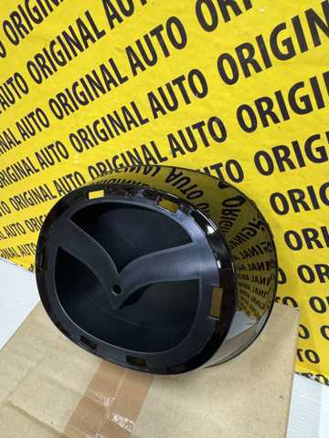 Кронштейн емблеми решітки радіатора GBFN50716 Mazda