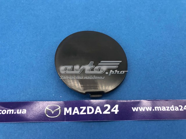 Заглушка бампера буксирувального гака, передня Mazda DK8A50A12ABB ціна, від 11.29 USD