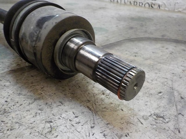 Піввісь передня ліва Mazda GDB12560XA