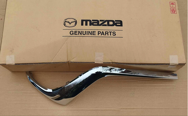 Купити KAAA507K0A Mazda Молдинг решітки радіатора, лівий