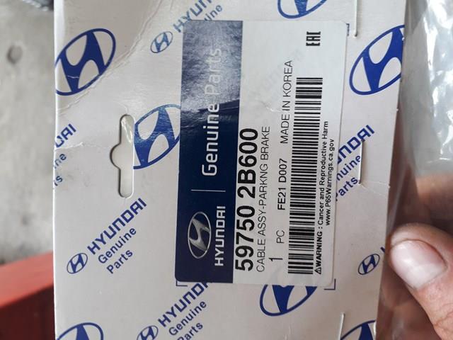 Трос ручника передній Hyundai/Kia 597502B600