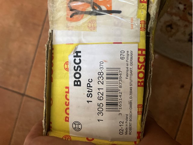 Скло фари правої 1305621238 Bosch
