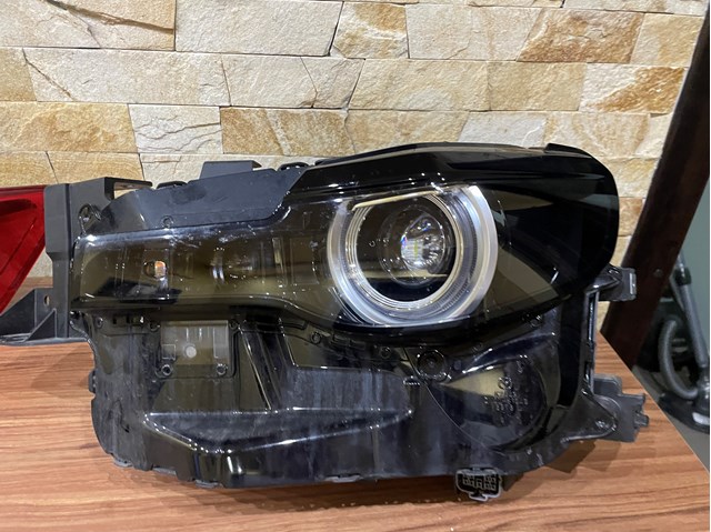 Фара ліва DN4L51040 Mazda
