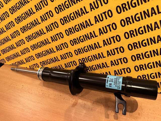 Купити KJK334700 Mazda Амортизатор передній, правий