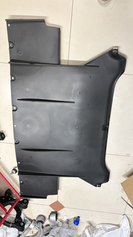 105732600B Tesla Захист днища, задній