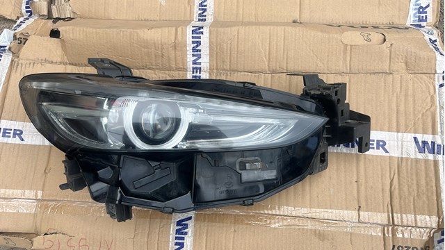 Фара передня права Mazda GSJ451031A