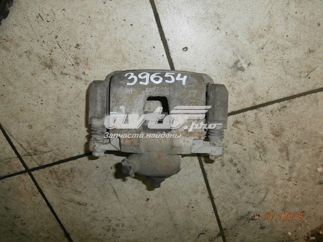 Супорт гальмівний передній лівий 96212321 General Motors