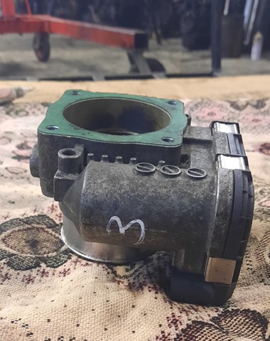 Дросільна заслінка 06B133062M Bosch