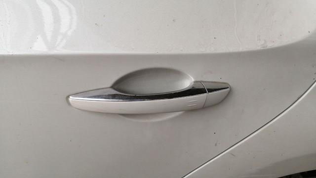 Ручка задньої двері зовнішня ліва 1606874780 Peugeot/Citroen