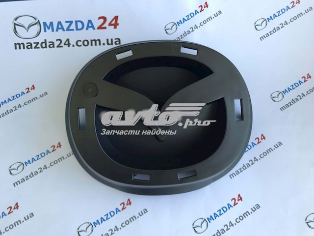 Фірмовий значок решітки радіатора Mazda G46M50716