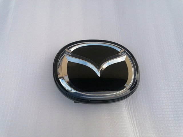 Купити GSH751730 Mazda Емблема решітки радіатора
