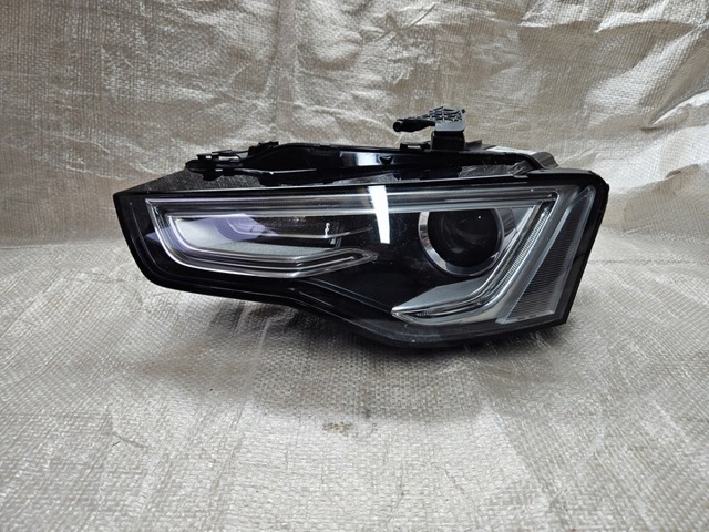 Основна фара в зборі ліва VAG 8T0941005C ціна, від 443.37 USD