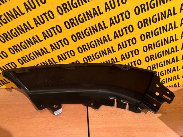 Переднє праве ікло бампера Mazda KMV850121