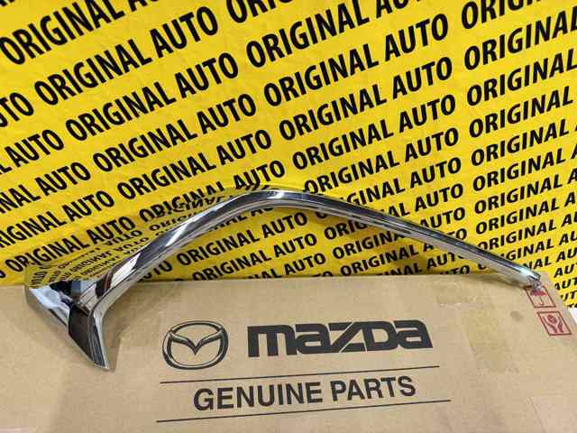 D10J507K0C Mazda Молдинг переднього бампера, лівий