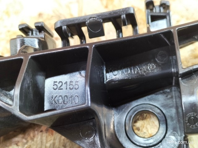 Кронштейн бампера заднього, правий Toyota 52155K0010