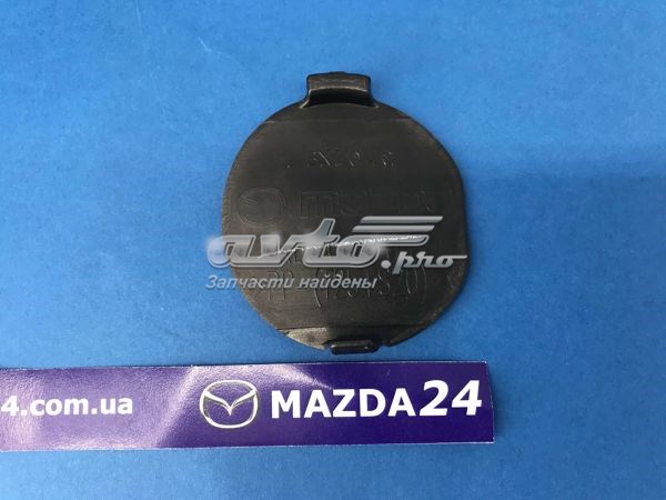 Заглушка бампера буксирувального гака, передня Mazda KB8A50A11BBB ціна, від 5.05 USD