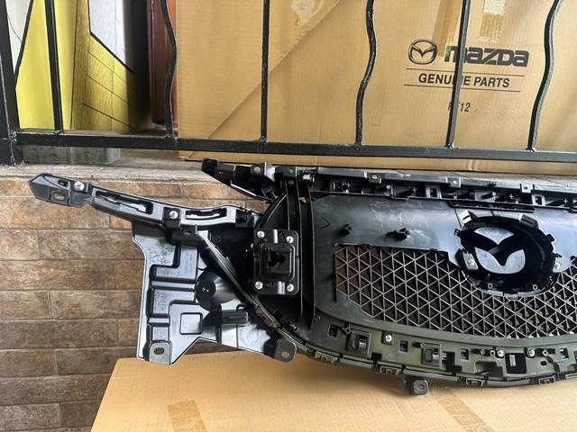Купити KB8A50710K Mazda Захисна решітка радіатора