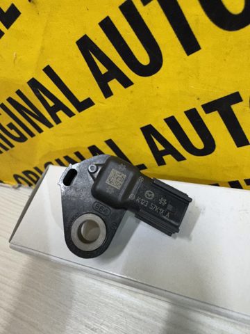 Датчик подушки безпеки Mazda K12357K1XA