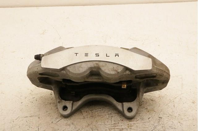 Купити 104462100D Tesla Супорт гальмівний передній лівий