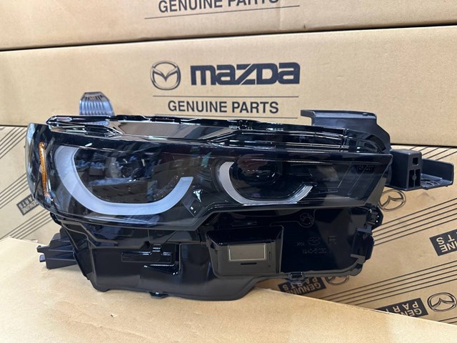 Фара права VA4151030C Mazda