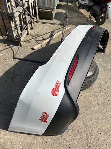 Бампер задній, нижня частина Tesla 105835400F ціна, від 104.19 USD