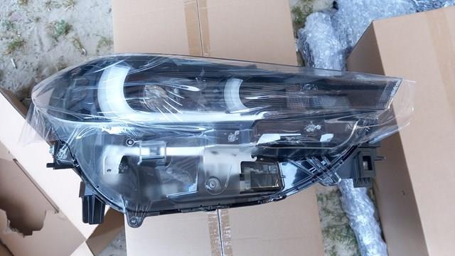 Фара передня права Mazda KSD651030