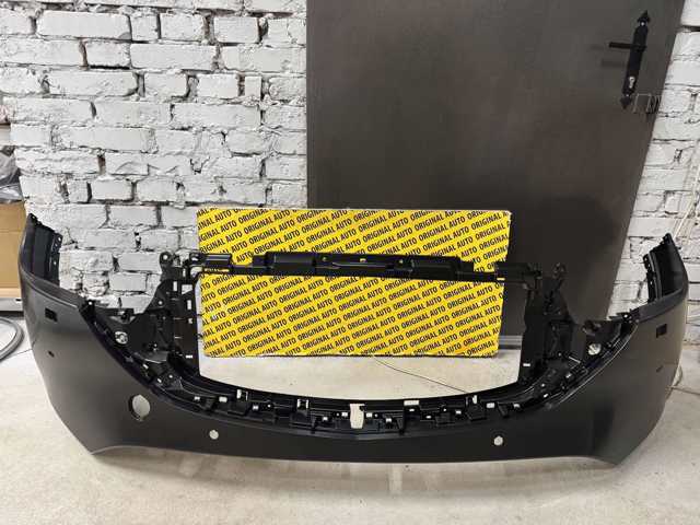 Бампер передній Mazda KSD750031A8P