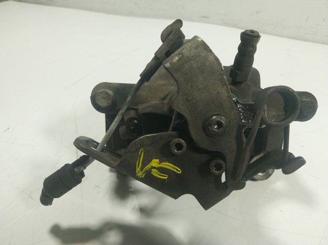 Супорт задній правий 1843320 Ford