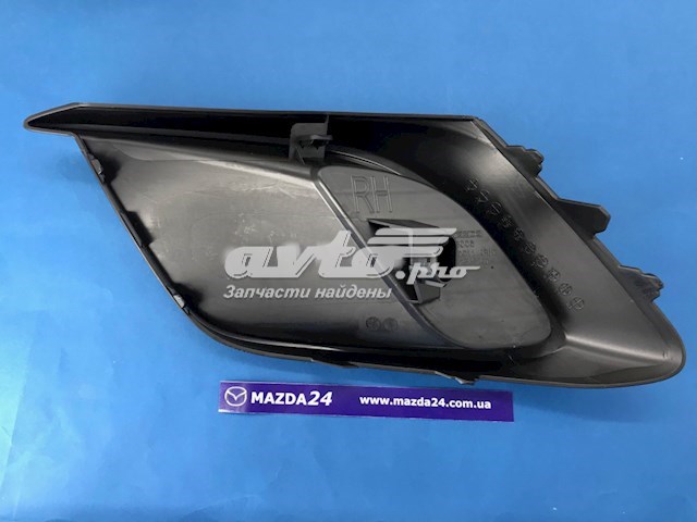 Заглушка/ решітка протитуманних фар бампера переднього, права BHN150C11A Mazda