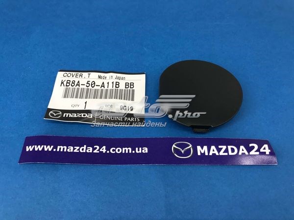 KB8A50A11BBB Mazda Заглушка бампера буксирувального гака, передня