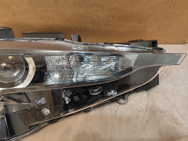 K12451030 Mazda Основна фара - вставка