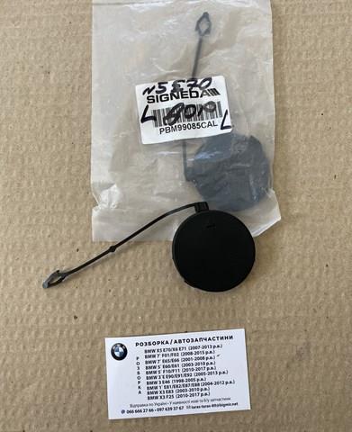 PBM99085CAL Signeda Заглушка бампера буксирувального гака, передня ліва