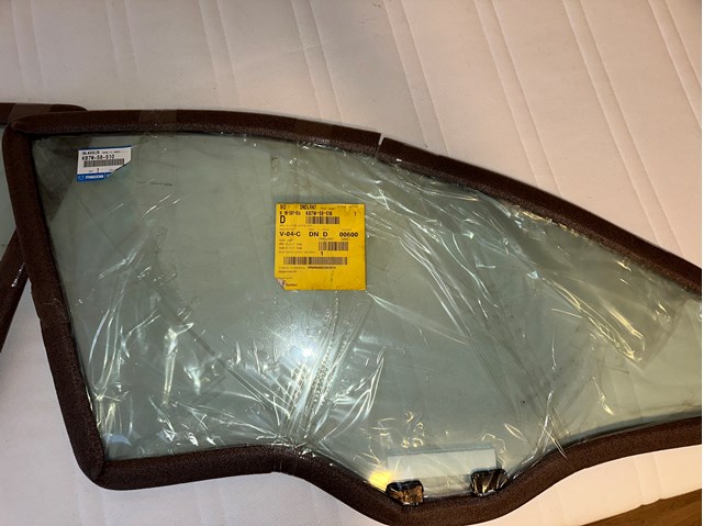 Скло передньої правої двері Mazda KB7W58510 ціна, від 61.63 USD