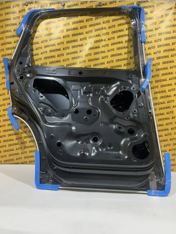 Двері пасажирськи задні ліві Mazda KMY17302X