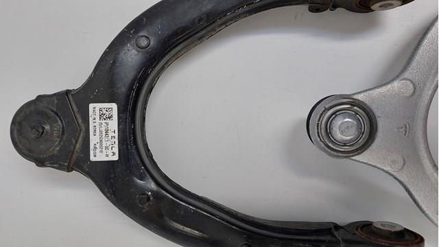 Важіль передньої підвіски верхній, лівий 128832100A Tesla