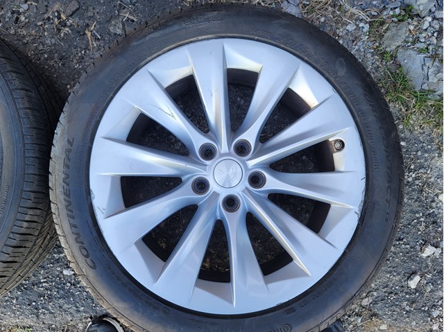  107689100B Tesla